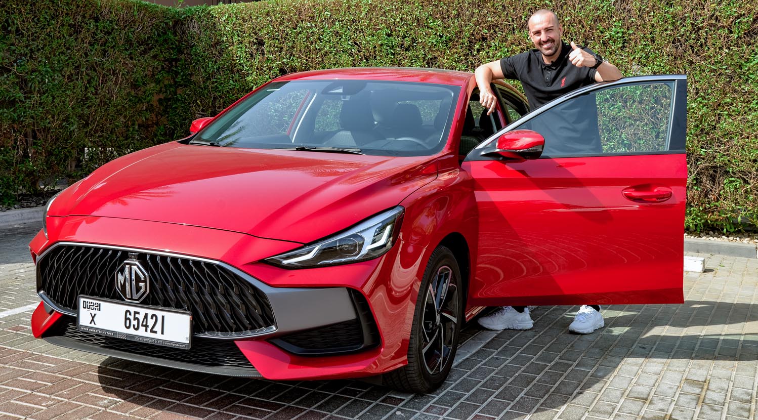 Former Liverpool F.C. Player, Jose Enrique, Poses Next To MG Motor’s Newest Star